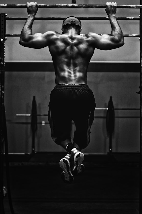 Person performing a dumbbell exercise